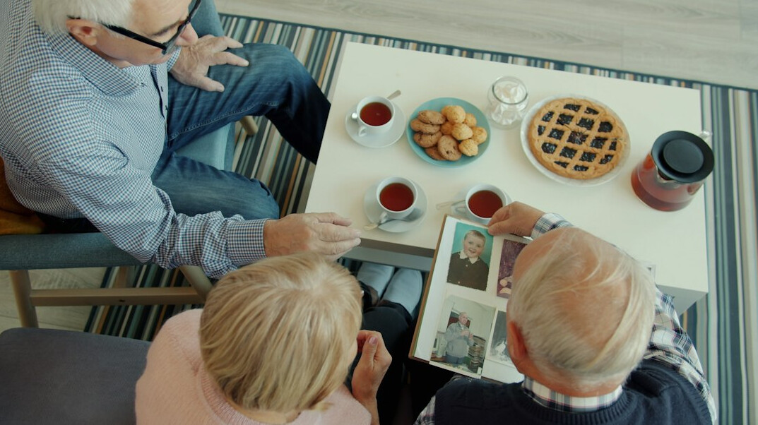 family discussing finances at table