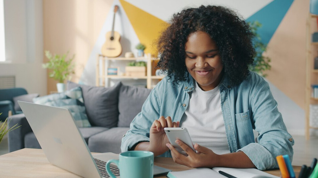 young adult reviewing savings goals