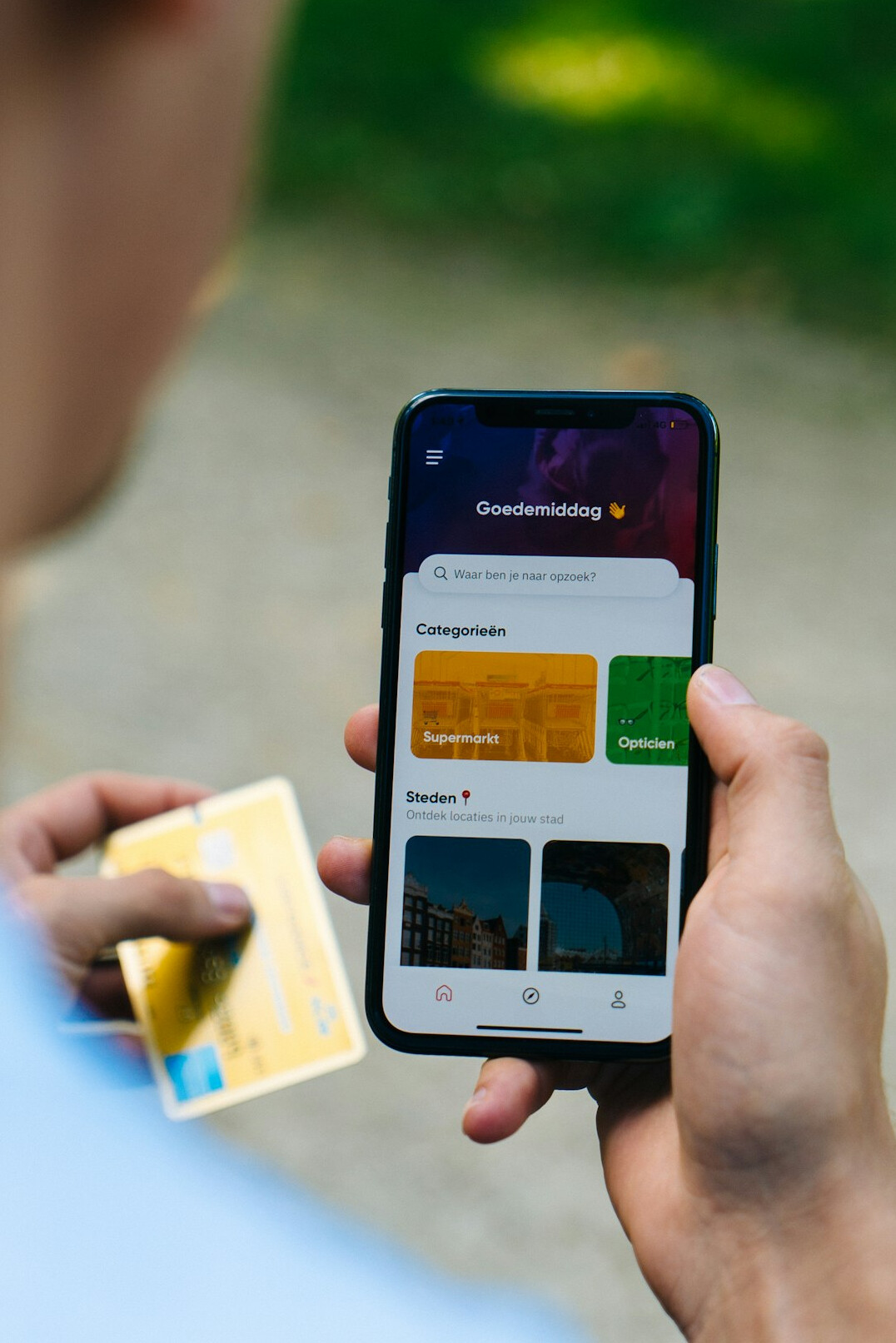 person checking investment app on phone